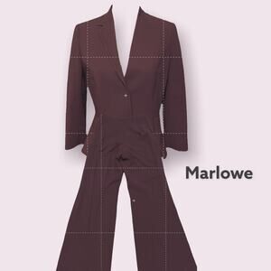 Marlowe  two piece Suit 100% wool. Lining 85% rayon, 15% lycra